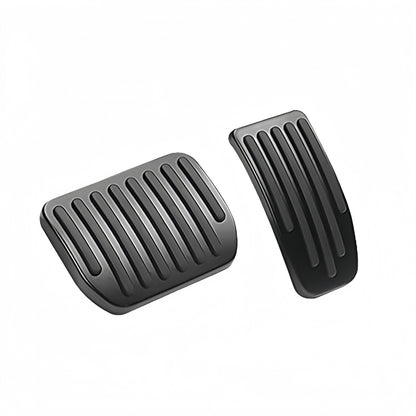 Anti-slip pedal covers with rubber inserts designed to improve driving control and comfort in Tesla Model 3 and Model Y