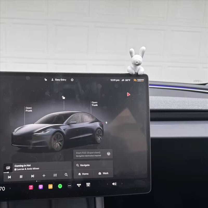 PVC dog ornament made with fade-resistant and odor-free materials, safe for long-term use in Tesla interiors