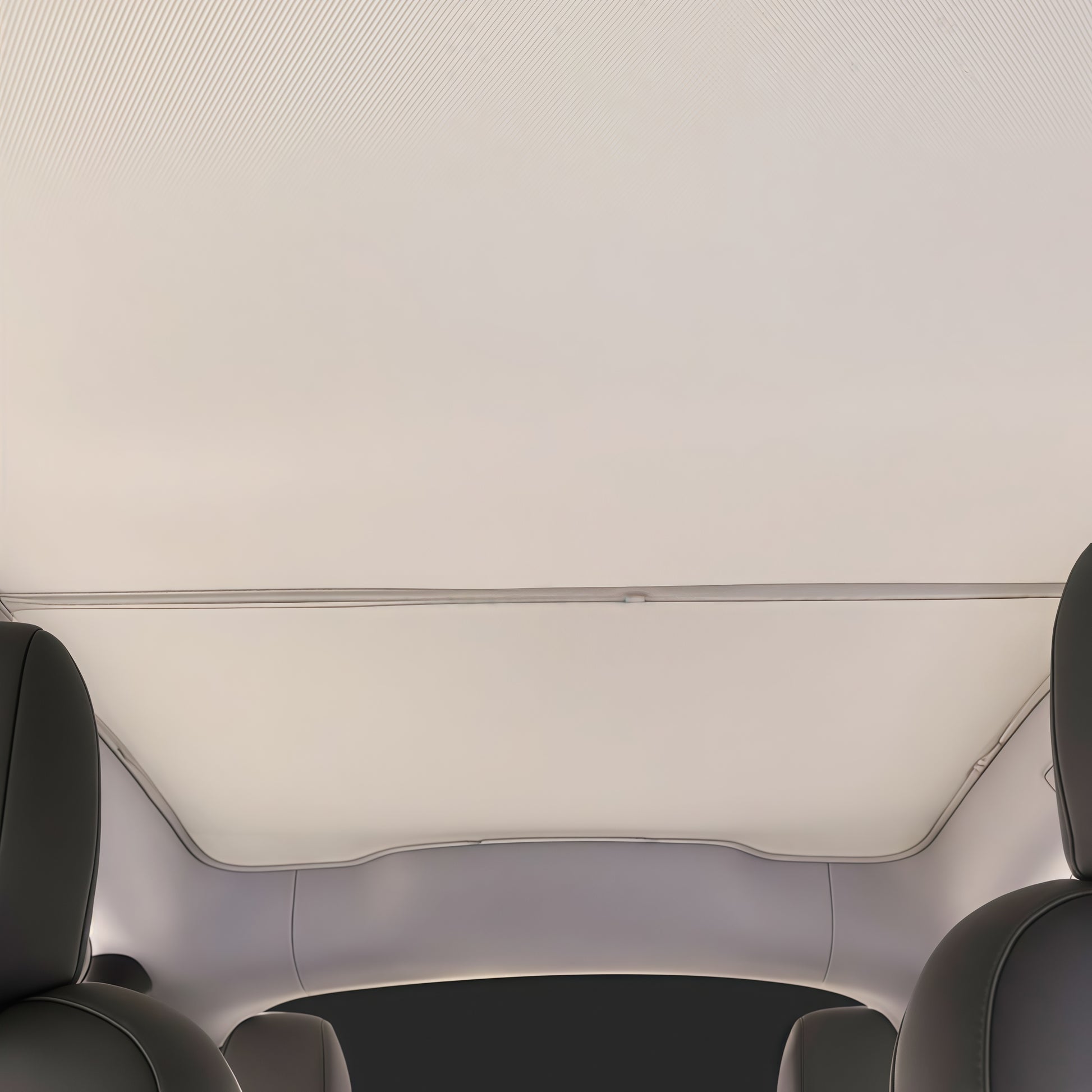 Panoramic roof sunshade installed in Tesla Model Y to block sunlight, reduce glare, and improve interior cooling comfort
