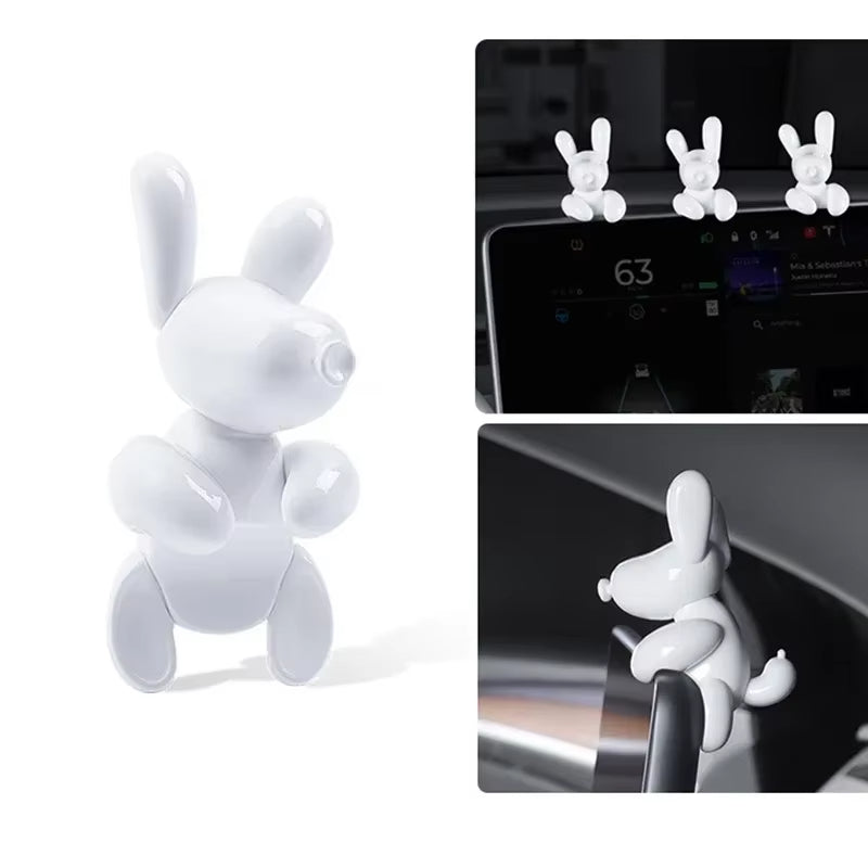 Easy-install dog dashboard ornament that attaches cleanly to Tesla center screens with included double-sided tape