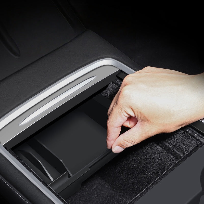 Rear console organizer tray for Tesla Model Y Juniper offering segmented compartments for a clean and clutter-free interior setup